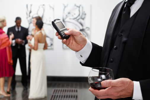 BoB NYC Art Galleries - Man Holding phone & wine