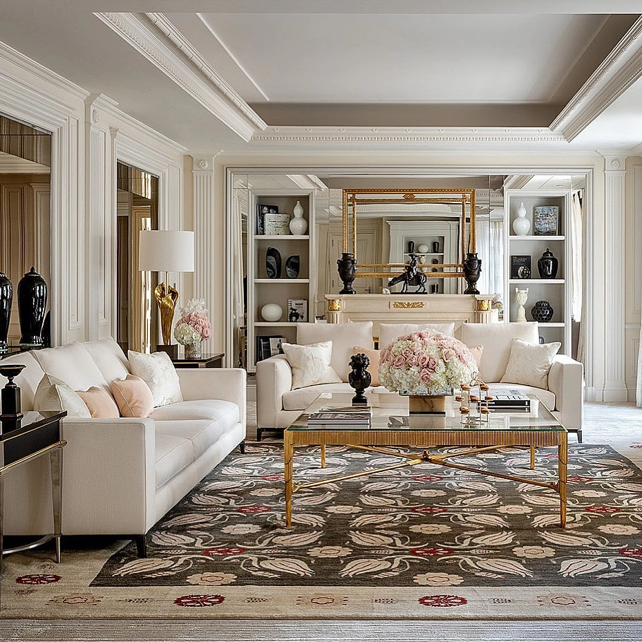 interior of a hotel - white sofas, white walls, gold table and a brown and white mosaic floor, best four seasons hotels in the world