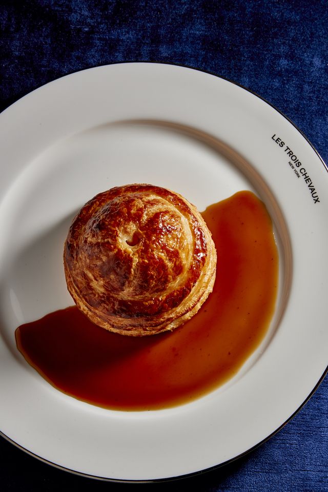 Soft pastry served with a bit of sauce.