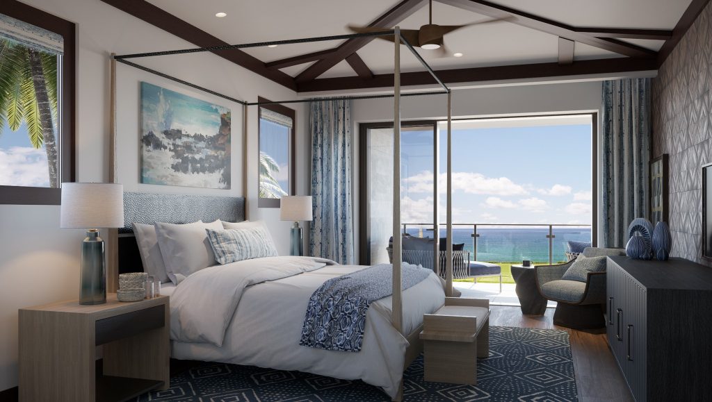 a blue and white furnished hotel room looking onto blue sea and blue sky