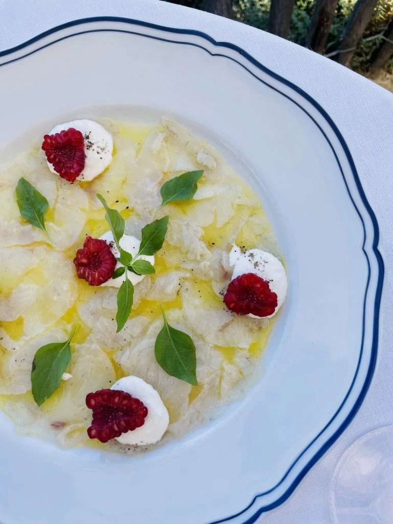 Branzino Carpaccio with Stracciatella + Raspberry