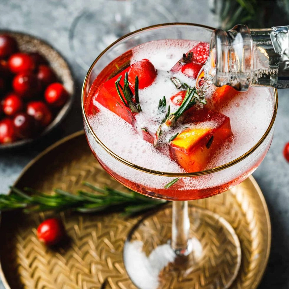 Holiday cocktail cranberry ice cubes kale junkie