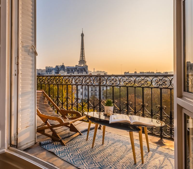 Beautiful Paris Balcony at Sunset with Eiffel Tower View