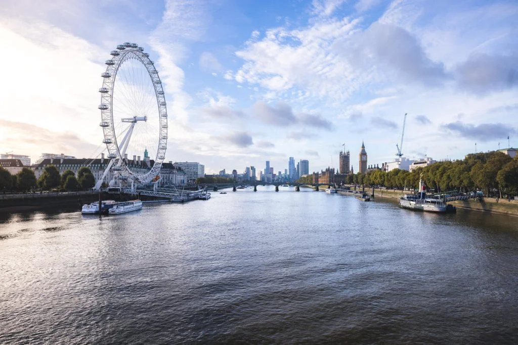 A view down the river Thames to the Houses of Parliament, Palace of Westminster and the London Eye