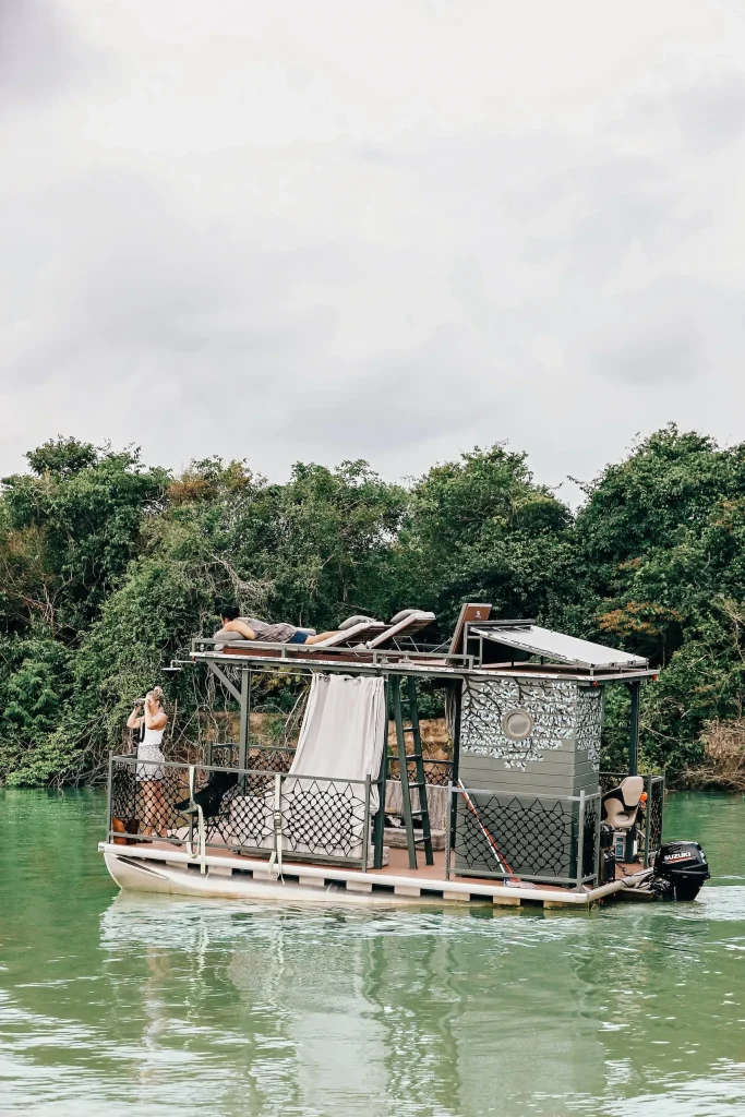 Sunrise boat tour through Cambodia rainforest near Shinta Mani Wild
