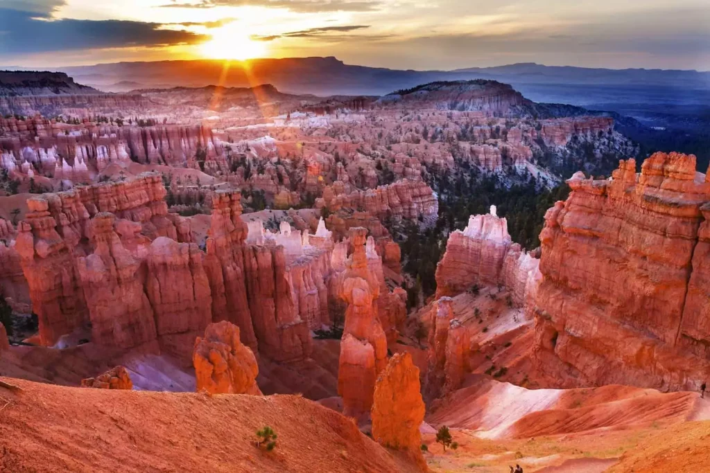 Sunset over Bryce Canyon hoodoos in Southern Utah during luxury national park road trip